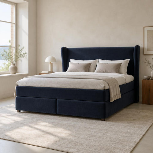 Boxspringbett Zugo – dunkelblauer Samt mit Ohrenkopfteil